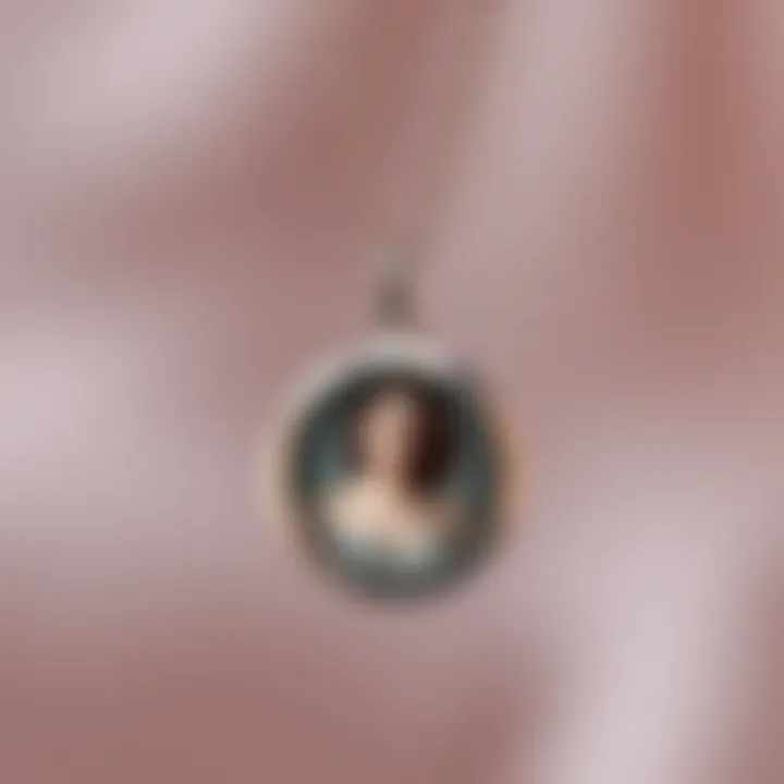 An elegant silver necklace featuring a circular pendant with a miniature photo