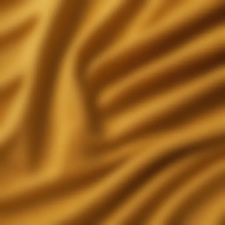 Close-up of fabric texture of a mustard yellow crop top