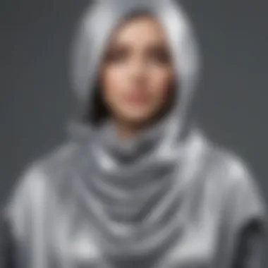 Sophisticated Draping Techniques Elegant styling of a silver metallic scarf draped on a stylish outfit