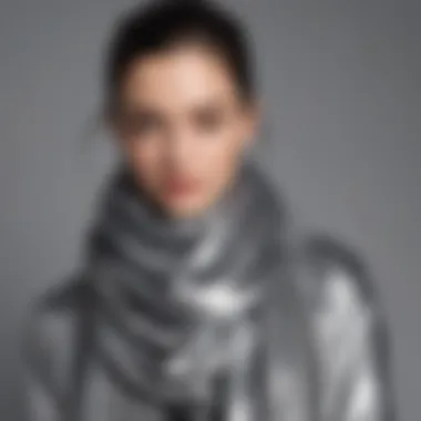 A dynamic fashion ensemble featuring a silver metallic scarf as a statement accessory