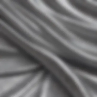 Detail of Shimmering Texture Close-up of the shimmering fabric of a silver metallic scarf under natural light
