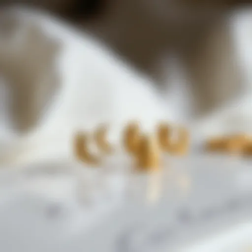 Elegant gold moon nail decals on a polished surface