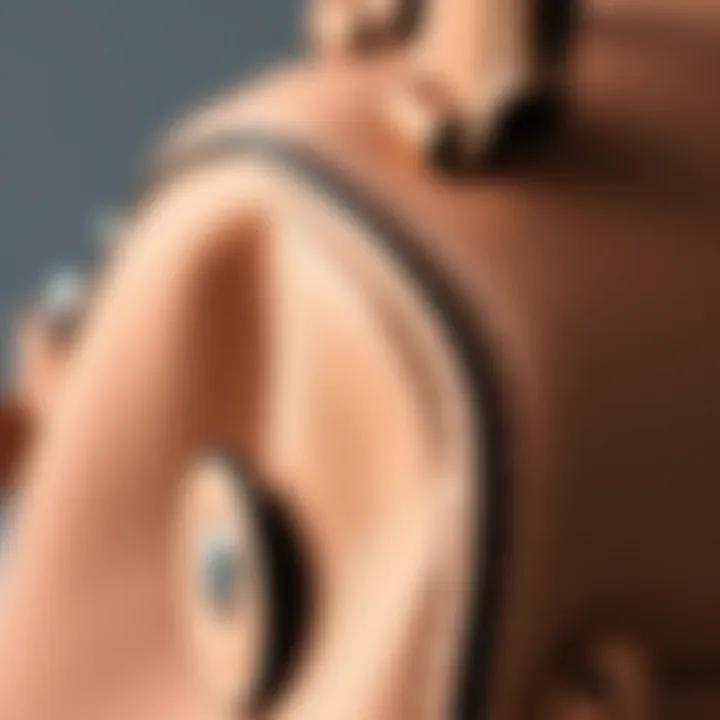 Close-up view of the mini double handle satchel bag showcasing intricate stitching and material texture