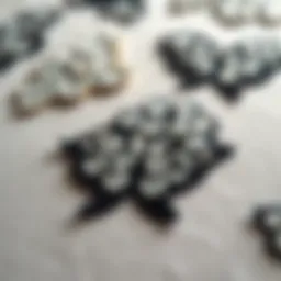 A close-up view of intricate crystal patches on a fabric surface showcasing their sparkle.