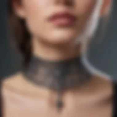 A close-up of a tattoo choker necklace showcasing intricate designs