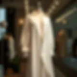 Elegant long white blouse draped on a stylish mannequin