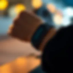 A close-up view of a sleek exercise wristband showcasing its digital display and design.