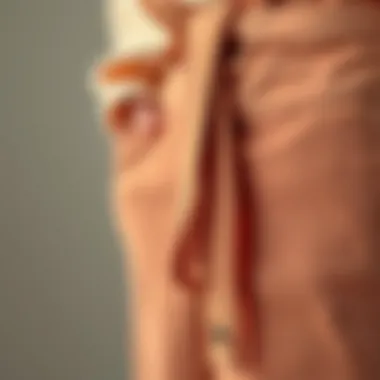 Close-up of fabric textures used in high waist belted wide leg pants