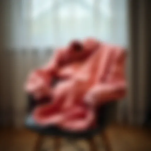 Cozy maternity fleece jacket draped over a chair