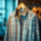 A stylish plus size gingham shirt on a hanger, showcasing the fabric's texture